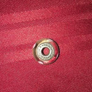 Pandora Murano pink glass bead w/ white flowers.